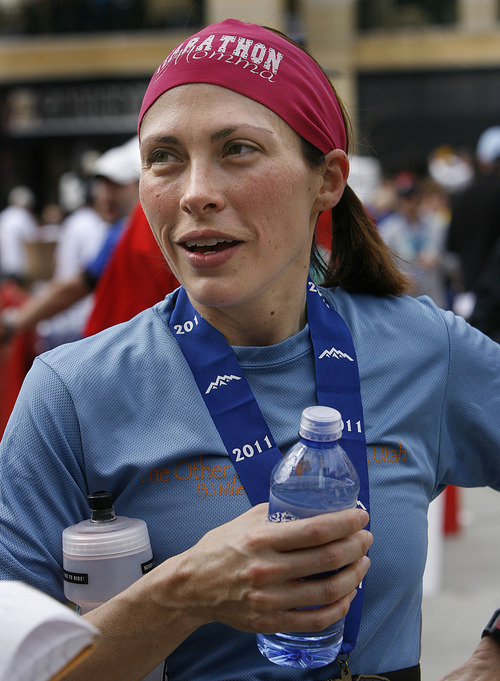 Scott Sommerdorf  |  The Salt Lake Tribune
Allison Gerrard after she finished in The Salt Lake Marathon, Saturday, April 16, 2011.