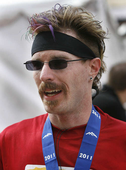 Scott Sommerdorf  |  The Salt Lake Tribune
Chris Perkins of Lehi after he finished The Salt Lake Marathon, Saturday, April 16, 2011.
