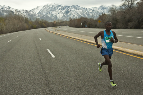 Photo by Chris Detrick | The Salt Lake Tribune 
Joseph Mutinda runs during the 2011 Salt Lake Marathon Saturday April 16, 2011.