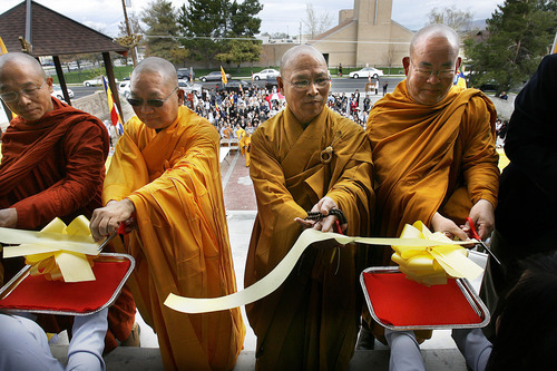 Scott Sommerdorf  |  The Salt Lake Tribune
Buddhist leaders from around the country including Buddhist Monk, Thich Tri Lang, of the Unified Vietnamese Buddhist Congregation in the United States, (second from left), cut a ceremonial ribbon opening the Lien Hoa Buddhist Temple. The Lien Hoa Buddhist Temple opened in West Valley City Sunday after a decade of planning, Sunday, April 17, 2011.