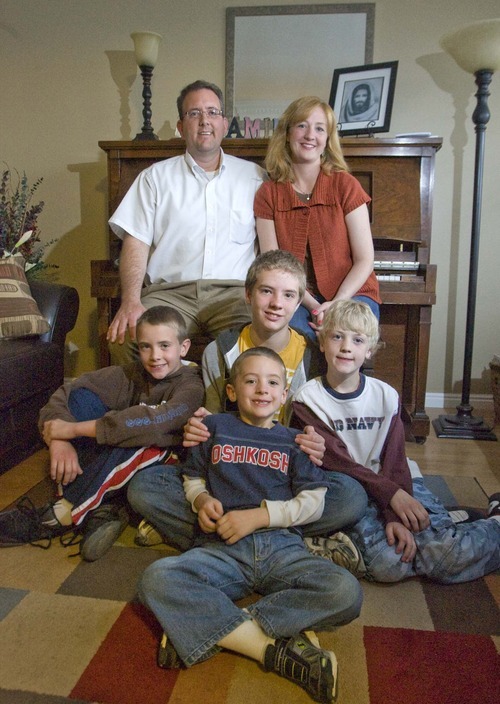 Paul Fraughton  |  The Salt Lake Tribune
The Scheffner family in their Sandy home. Parents Gary and Jennifer and their four boys, clockwise from front, Zach, Sam, Ben and Jake.