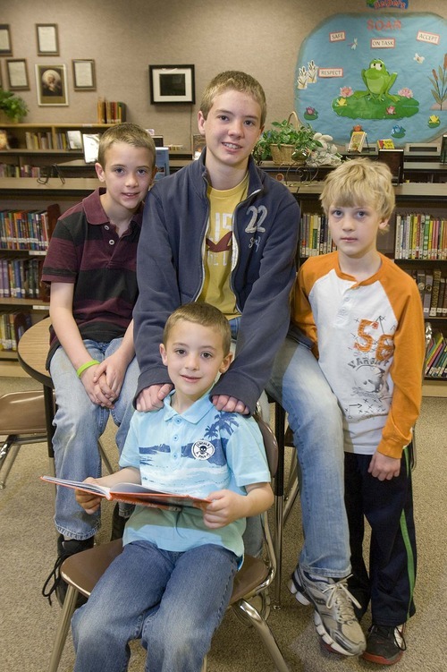 Paul Fraughton  |  The Salt Lake Tribune
The Scheffner kids at Sunrise Elementary School's  library on  Tuesday,  April 12, 2011. Clockwise from front: Zach, Sam, Ben and Jake.