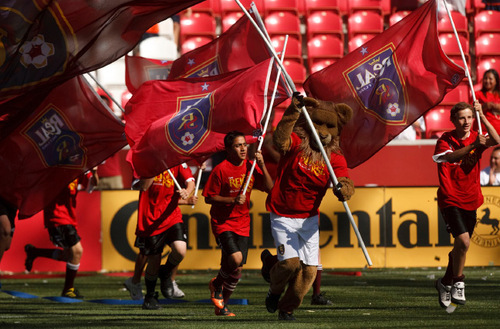 Leah Hogsten  |  The Salt Lake Tribune 
Leo The Lion leads a parade of Real fans around the stadium after the game. 
Real Salt Lake defeated the Chicago Fire 1-0  at Rio Tinto Stadium Saturday, September 18, 2010, in Sandy.