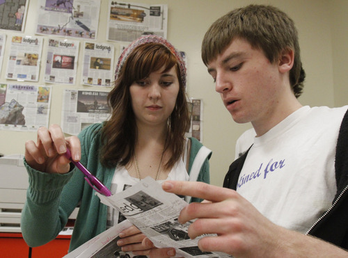 Rick Egan   |  The Salt Lake Tribune

Bonnie Barrett and Ben Dahl work on the next issue of the Taylorsville High student newspaper,  Monday, March 28, 2011. The Utah Press Association named Taylorsville High's newspaper, the Warrior Ledger, the best high school paper in the state.