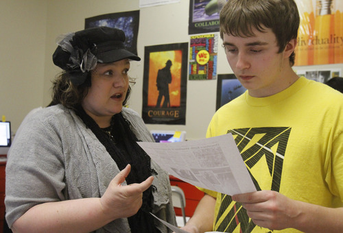 Rick Egan   |  The Salt Lake Tribune

Taylorsville High student newspaper advisor Mary Seal discusses some issues with Alexander Bowen, Monday, March 28, 2011. The Utah Press Association named Taylorsville High's newspaper, the Warrior Ledger, the best high school paper in the state.