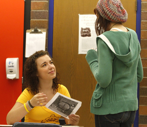 Rick Egan   |  The Salt Lake Tribune

Award-winning reporter Kiley Atkins (left) chats with Bonnie Barrett, editor in chief, of the student newspaper at Taylorsville High, Monday, March 28, 2011. The Utah Press Association named Taylorsville High's newspaper, the Warrior Ledger, the best high school paper in the state.