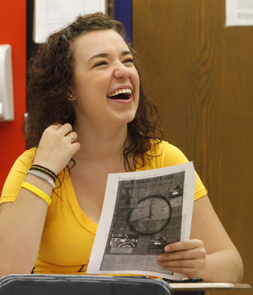 Rick Egan   |  The Salt Lake Tribune

Award-winning reporter Kiley Atkins (left) chats with Bonnie Barrett, editor in chief, of the student newspaper at Taylorsville High, Monday, March 28, 2011. The Utah Press Association named Taylorsville High's newspaper, the Warrior Ledger, the best high school paper in the state.