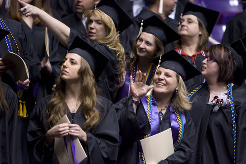 Al Hartmann  |  The Salt Lake Tribune 
Weber State University graduates are in high spirits in the Dee Events Center on Friday, April 22, for the university's 137th commencement.