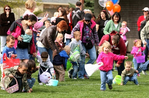 Leah Hogsten  |  The Salt Lake Tribune
Logan Stanley, 4, of West Jordan, right, running in pink, runs to collect toy-filled easter eggs. Stanley is allergic to tree nuts. The Utah Food Allergy Network hosted a no-candy, allergy free egg hunt for kids with food allergies at Southwood Park on Saturday.