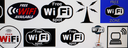 In this April 21, 2011 photo, Wi-Fi logos are shown on a computer screen search engine in Buffalo, N.Y.  The poll conducted for the Wi-Fi Alliance, the industry group that promotes wireless technology standards, found that 32 percent of respondents acknowledged trying to access a Wi-Fi network that wasn't theirs. An estimated 201 million households worldwide use Wi-Fi networks, according to the alliance. The same study, conducted by Wakefield Research, found that 40 percent said they would be more likely to trust someone with their house key than with their Wi-Fi network password. (AP Photo/David Duprey)