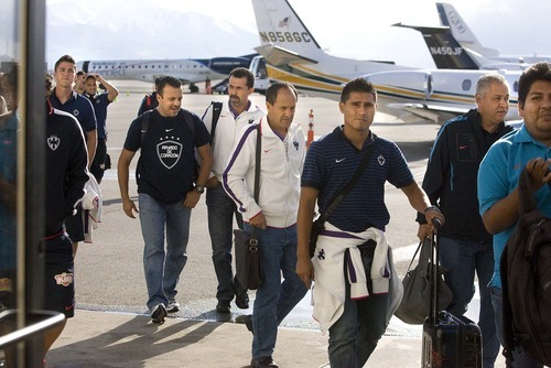 Paul Fraughton  |  The Salt Lake Tribune
Monterrey of Mexico players, coaches and staff  walk across the tarmac at the Million Air hangar in Salt Lake City after their plane arrived from Mexico on  Monday,  April 25, 2011. On Wednesday at Rio Tinto Stadium, Monterrey will try to halt RSL's bid to become the first-ever team from Major League Soccer to win the CONCACAF Champions League.