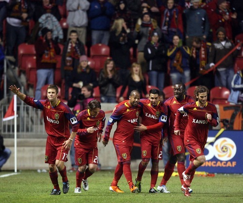 Steve Griffin  |  The Salt Lake Tribune
 
Andy Williams, center, is congratulated by his Real Salt Lake teammates after scoring a goal during second half action in the CONCACAF Champions League quarterfinal game between Real Salt Lake and Columbus at Rio Tinto Stadium in Sandy on Tuesday, March 1, 2011.