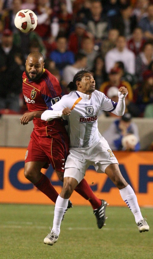 Leah Hogsten  |  The Salt Lake Tribune
Real Salt Lake's Robbie Russell takes a header against Saprissa's Armando Alonso. Real Salt Lake  played the first  its two-game series against Saprissa of Costa Rica in the CONCACAF Champions League at Rio Tinto Stadium  Tuesday March 15, 2011.