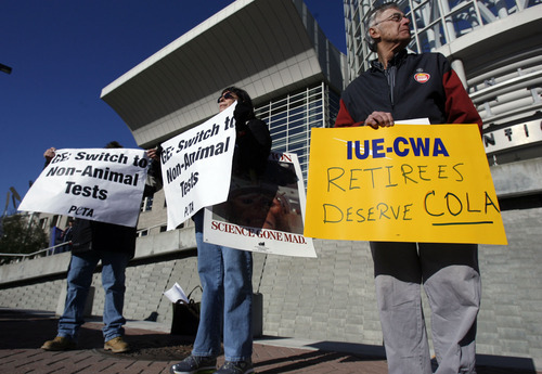 Francisco Kjolseth  |  The Salt Lake Tribune
Members of PETA, conservative activists and GE retirees protest General Electric's annual shareholders meeting at the Calvin L. Rampton Salt Palace Convention Center in Salt Lake City on Wednesday, April 26, 2011.