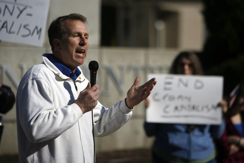 Francisco Kjolseth  |  The Salt Lake Tribune
Rep. Chris Herrod speaks at a rally to protest General Electric's annual shareholders meeting at the Calvin L. Rampton Salt Palace Convention Center in Salt Lake City on Wednesday, April 26, 2011.
