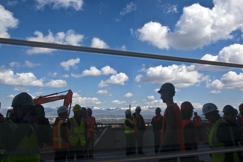Chris Detrick | The Salt Lake Tribune 
University workers, Rocky Mountain Power employees and members of the media tour the Utah Museum of Natural History's new home, the Rio Tinto Center, on Wednesday.