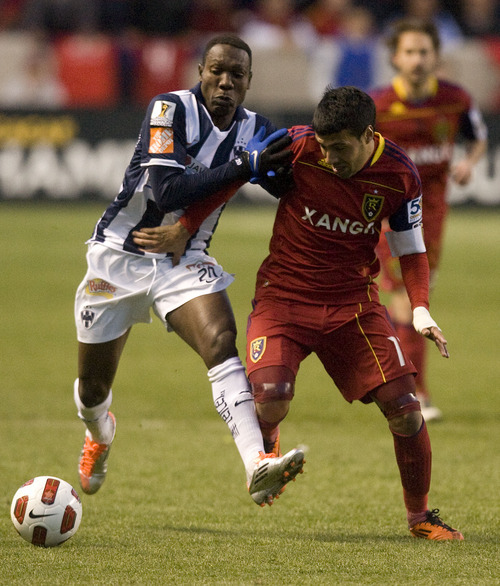 Steve Griffin  |  The Salt Lake Tribune

Walter Ayovi (20) and RSL's Javier Morales (11) fight for control of the ball as Real Salt Lake faces CF Monterrey at RioTinto Stadium Wednesday, April 27, 2011