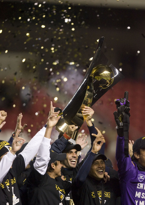Steve Griffin  |  The Salt Lake Tribune

Monterrey players celebrate with the CONCACAF trophy after defeating Real Salt Lake for the championship  at Rio Tinto Stadium in Sandy, Utah Wednesday, April 27, 2011.