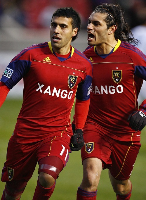 Djamila Grossman  |  The Salt Lake Tribune

Real Salt Lake's Javier Morales (11) and Fabian Espindola (7) celebrate after their team scored the second goal against Los Angeles Galaxy during a game at Rio Tinto Stadium in Sandy on Saturday,  March 26, 2011.