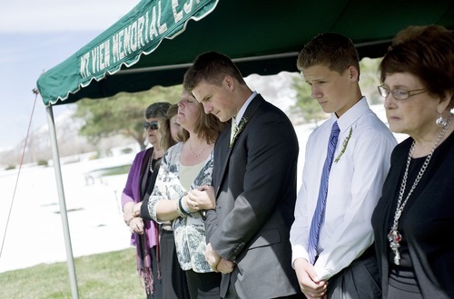 Sarah A. Miller  |  The Salt Lake Tribune

Diane and Jerry Dearden stand arm-in-arm during Daren Dearden's dedication of the grave at Mountain View Memorial Mortuary & Cemetery Monday April 11, 2011 in Cottonwood Heights. Hugh passed away April 4 after battling prostate cancer.