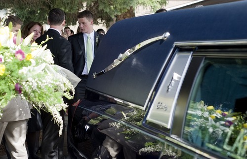 Sarah A. Miller  |  The Salt Lake Tribune

The Dearden family waits outside of the church after the funeral service to head to the grave site Monday April 11, 2011 in Cottonwood Heights.