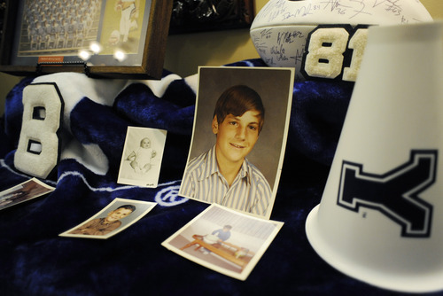 Sarah A. Miller  |  The Salt Lake Tribune

A table at the visitation displays old photographs of Hugh Dearden and sports memorbilla. He was a huge BYU fan although he graduated from the University of Utah.
