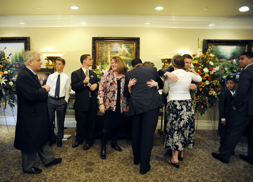 Sarah A. Miller  |  The Salt Lake Tribune

The Dearden family greets guests at Hugh's visitation Sunday April 10, 2011 at Larkin Mortuary in Sandy. Hundreds of friends and family attended the visitation.