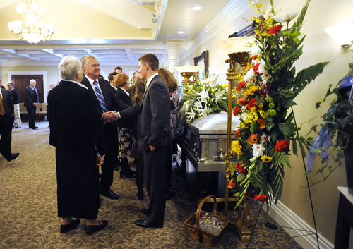 Sarah A. Miller  |  The Salt Lake Tribune

Jerry Dearden, 18, greets guests at the visitation for his father Hugh Deardon Sunday April 10, 2011 in Sandy. Hugh died at age 48 from cancer.