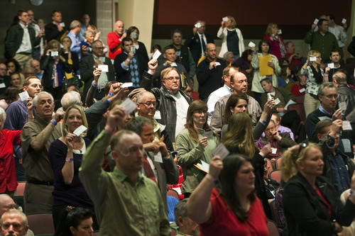 Photo by Chris Detrick | The Salt Lake Tribune 
Delegates vote against of a resolution seeking to repeal a guest worker immigration bill during the annual Utah County Republican Party convention at Maple Mountain High School  Saturday April 30, 2011.  A resolution seeking to repeal a guest worker immigration bill signed by the governor earlier this year passed narrowly at the Utah County Republican Organizing Convention.