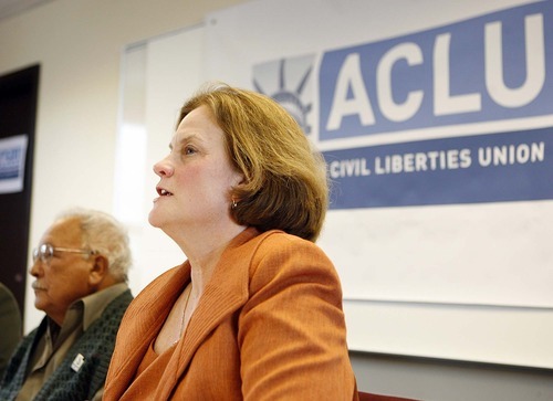 TRENT NELSON  |  The Salt Lake Tribune
Karen McCreary, executive director of the ACLU of Utah, and Archie Archuletta discuss the lawsuit Tuesday.