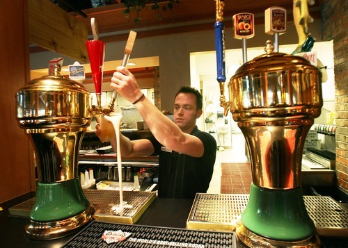 Steve Griffin  |  The Salt Lake Tribune

Iggy's bartender Brock Noel pours a beer at the Salt Lake City restaurant on Wednesday, May 4, 2011.
