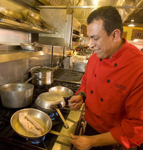 Paul Fraughton  |  The Salt Lake Tribune
Raul Mendez, the chef at Frida Bistro, cooks chicken from his mother's recipe.