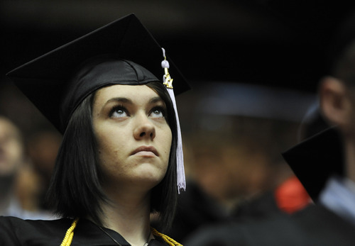 Sarah A. Miller  |  The Salt Lake Tribune

Architecture graduate Randi Domgaard of Salt Lake City watches the speakers on a screen at the University of Utah commencement at the Huntsman Center on Friday, May 6, 2011, in Salt Lake City. Over 7,000 students received their degrees.