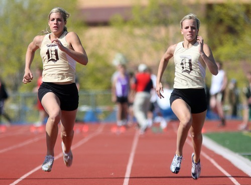 Leah Hogsten  |  The Salt Lake Tribune
Davis High School's sprinters Tara Andersen (left) and Bailee Carling in the 100m Friday April 22, 2011 at the 2011 Wildcat Invitational track meet at Woods Cross High School.