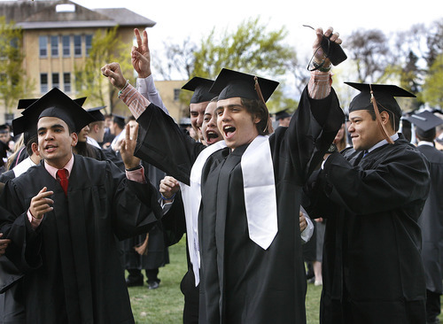 Scott Sommerdorf  |  The Salt Lake Tribune
Gian Pereyra celebrates with friends and fellow Economics & Finance students in the quad prior to Utah State's Graduation ceremonies in Logan, Saturday, May 7, 2011.