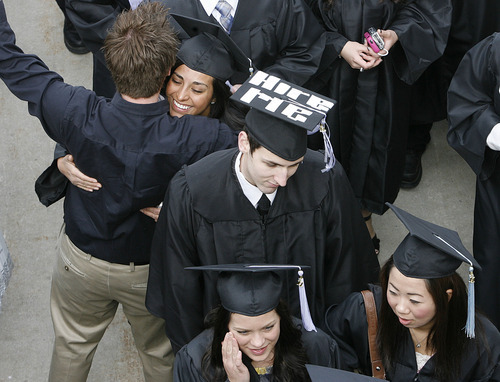 Scott Sommerdorf  |  The Salt Lake Tribune
One student had a message for potential employers as he walked in the procession to The Spectrum for Utah State's Graduation ceremonies in Logan, Saturday, May 7, 2011.