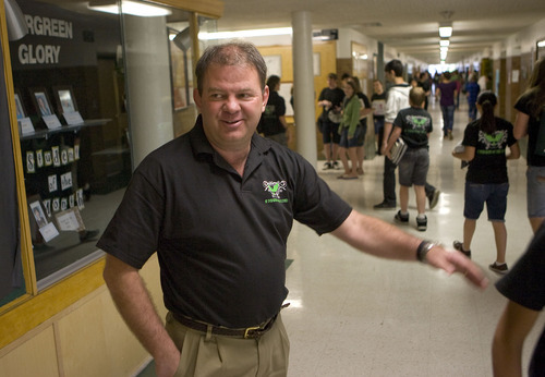 Al Hartmann  |  The Salt Lake Tribune
Mark Grant, principal at Evergreen Jr. High, is one of this year's Huntsman Awards for Excellence in Education winners. Since Grant has been principal at Evergreen, test scores and enrollment have gone up, whereas before a lot of the school's kids chose to go to other schools instead.
Every morning at 7:30 a.m. he greets students as they arrive at school with 