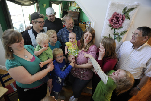 Sarah A. Miller  |  The Salt Lake Tribune

Sandy Christensen is surrounded by her large family at her home in South Jordan Wednesday May 3, 2011. Christensen has 12 children ranging from 6 months to age 26 and is author of the blog Twelve Makes a Dozen. She is also a grandmother.