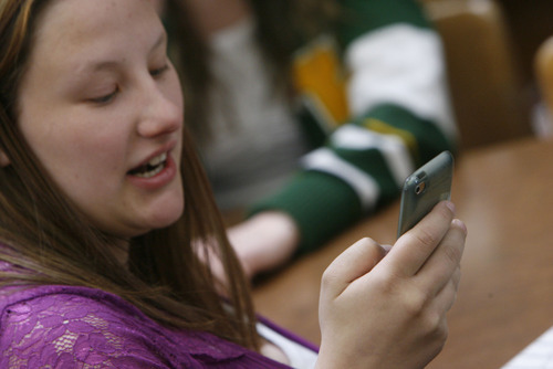 Francisco Kjolseth  |  The Salt Lake Tribune
Kearns High senior Laura Petersen, 18, talks about the benefits of the school's adoption of the iPod touch, especially since a medical condition keeps her from school sometimes, and the device allows her to keep up with her classes. She keeps her U.S. government flashcards on the device, which she said helps her study more often. 