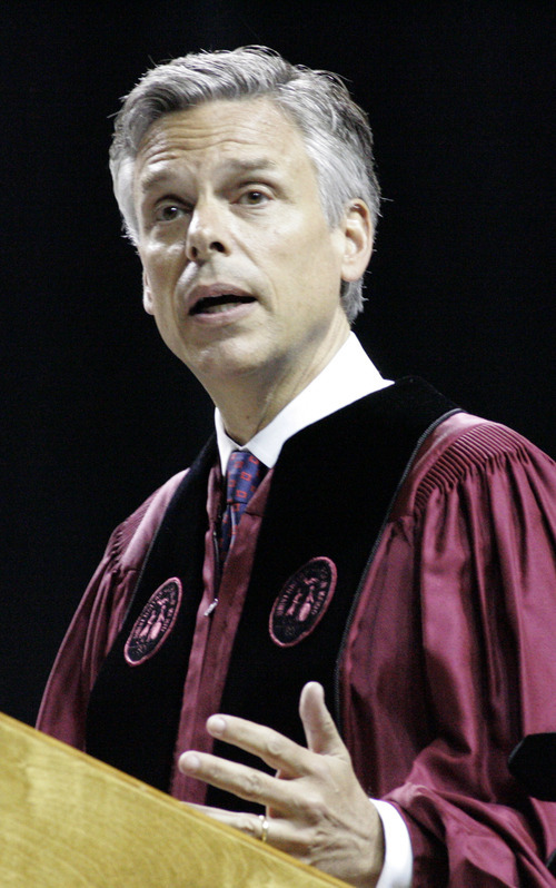 Former U.S. Ambassador to China and former Utah Gov. Jon Huntsman speaks at the commencement ceremony for the University of South Carolina on Saturday, May 7 2011 in Columbia, S.C.  Huntsman, weighing a Republican White House bid, used his first formal event after stepping down as President Barack Obama's ambassador to China to confront the line on his resume that conservatives were mostly likely to declare a deal-breaker. 
 (AP Photo/Mary Ann Chastain)
