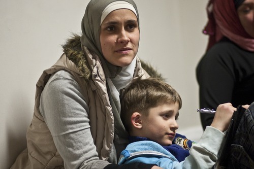 Photo by Chris Detrick | The Salt Lake Tribune 
Miriam Jaziri and her son Jakob, 6, listen during a 'Sister to Sister' meeting at the Al-Noor Mosque Friday April 29, 2011.