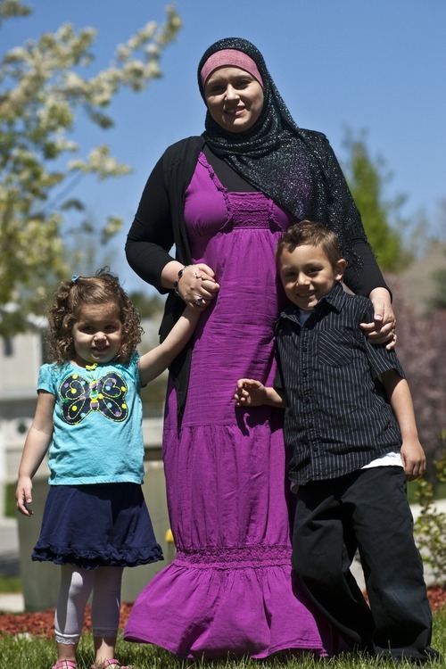 Chris Detrick | The Salt Lake Tribune 
Sharifa Al-Qaaydeh and her kids Sajed, 5, and Summer, 3, pose for a portrait at their home Wednesday May 4, 2011.
