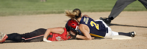 Photo by Chris Detrick | The Salt Lake Tribune 
Grand's Amanda Sheets (8) slides past second base and is tagged out by Enterprise's Summer Terry (2) during the game in Spanish Fork Thursday May 12, 2011.