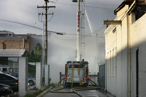 Scott Sommerdorf  |  The Salt Lake Tribune
Four alarm fire at an unoccupied building near 600 West between 200 and 300 South across from the Intermodal Hub, Saturday, May 14, 2011.