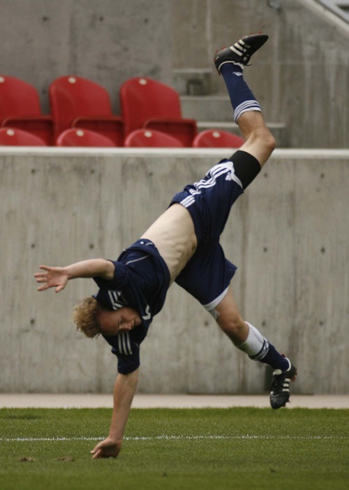 Trent Nelson  |  The Salt Lake Tribune
Waterford's Josh Warner cartwheels in celebration of his late goal as Waterford defeats St. Joseph 2-1 in the 2A State Championship high school soccer game at Rio Tinto Stadium, in Sandy, Utah, Saturday, May 14, 2011.