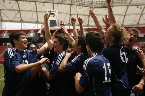 Trent Nelson  |  The Salt Lake Tribune
Waterford players celebrate with the state championship trophy after defeating St. Joseph 2-1 in the 2A State Championship high school soccer game at Rio Tinto Stadium, in Sandy, Utah, Saturday, May 14, 2011.