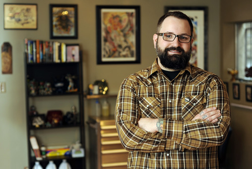 Sarah A. Miller  | The Salt Lake Tribune
Jon McAffee poses at his tattoo shop, Heart of Gold, on 400 South.