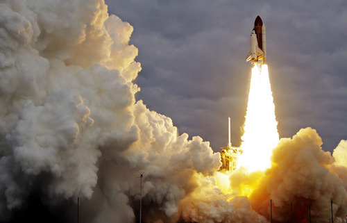 The space shuttle Endeavour lifts off from Kennedy Space Center in Cape Canaveral, Fla., Monday, May 16, 2011. The space shuttle Endeavour began a 14-day mission to the international space station. (AP Photo/John Raoux)