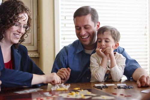 Trent Nelson  |  The Salt Lake Tribune
New state Sen. Aaron Osmond plays a game of Risk on Friday with wife Nancy and son Jackson.