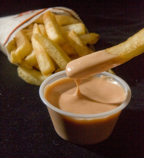 Paul Fraughton  |  The Salt Lake Tribune
The founder of Arctic Circle restaurants created fry sauce in the 1950s as an alternative dipping sauce for french fries. Since then, most every Utah restaurant has developed its own version using ketchup, mayonnaise, pickle relish and spices. Pictured, fry sauce from Crown Burger.